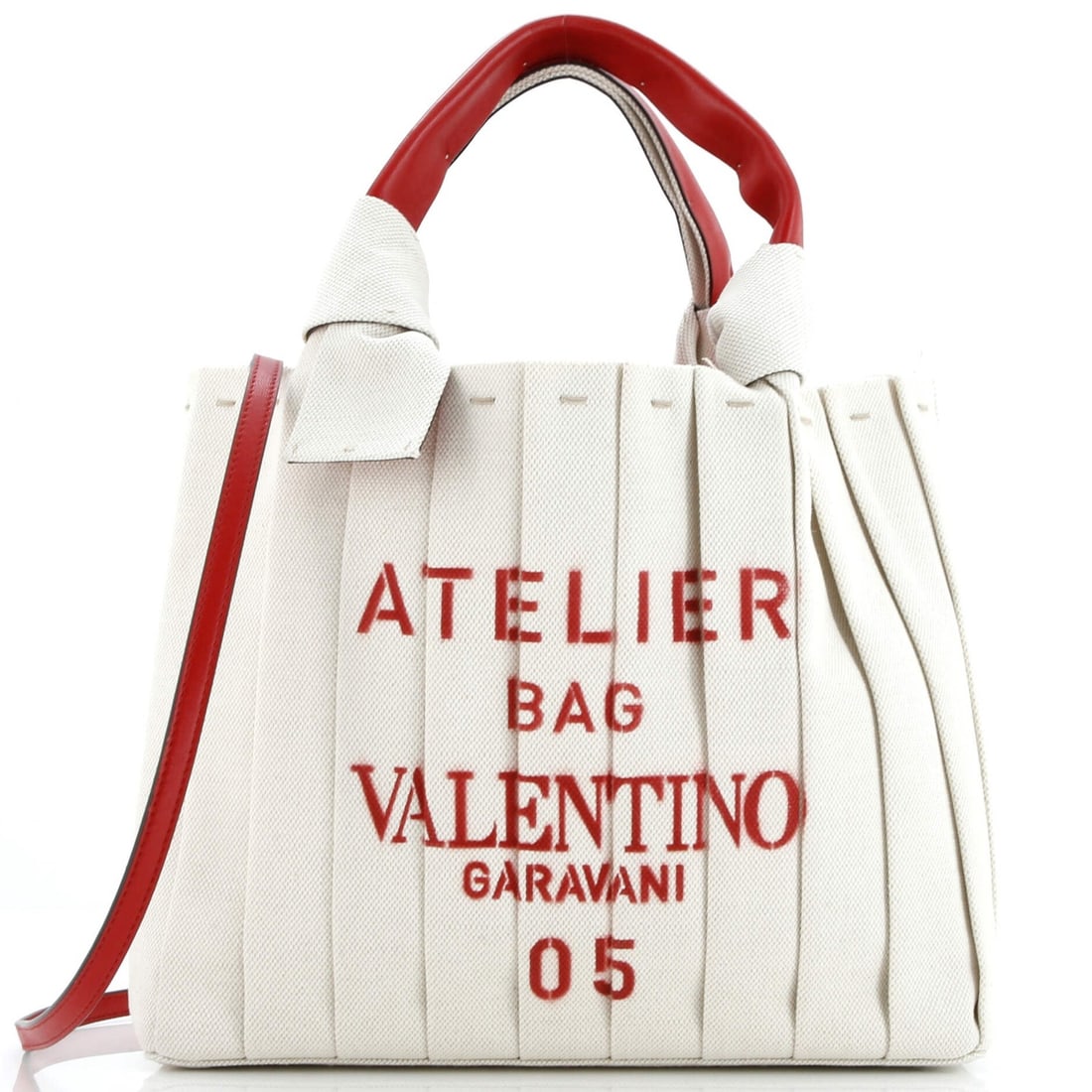 Valentino Garavani Atelier 05 Pleated Canvas Tote in Medium: Valentino Garavani Atelier 05 Pleated Canvas Tote in Medium The Valentino Garavani Atelier 05 Pleated Canvas Tote is a stunning, statement piece that exudes luxury and sophistication. With its bold re