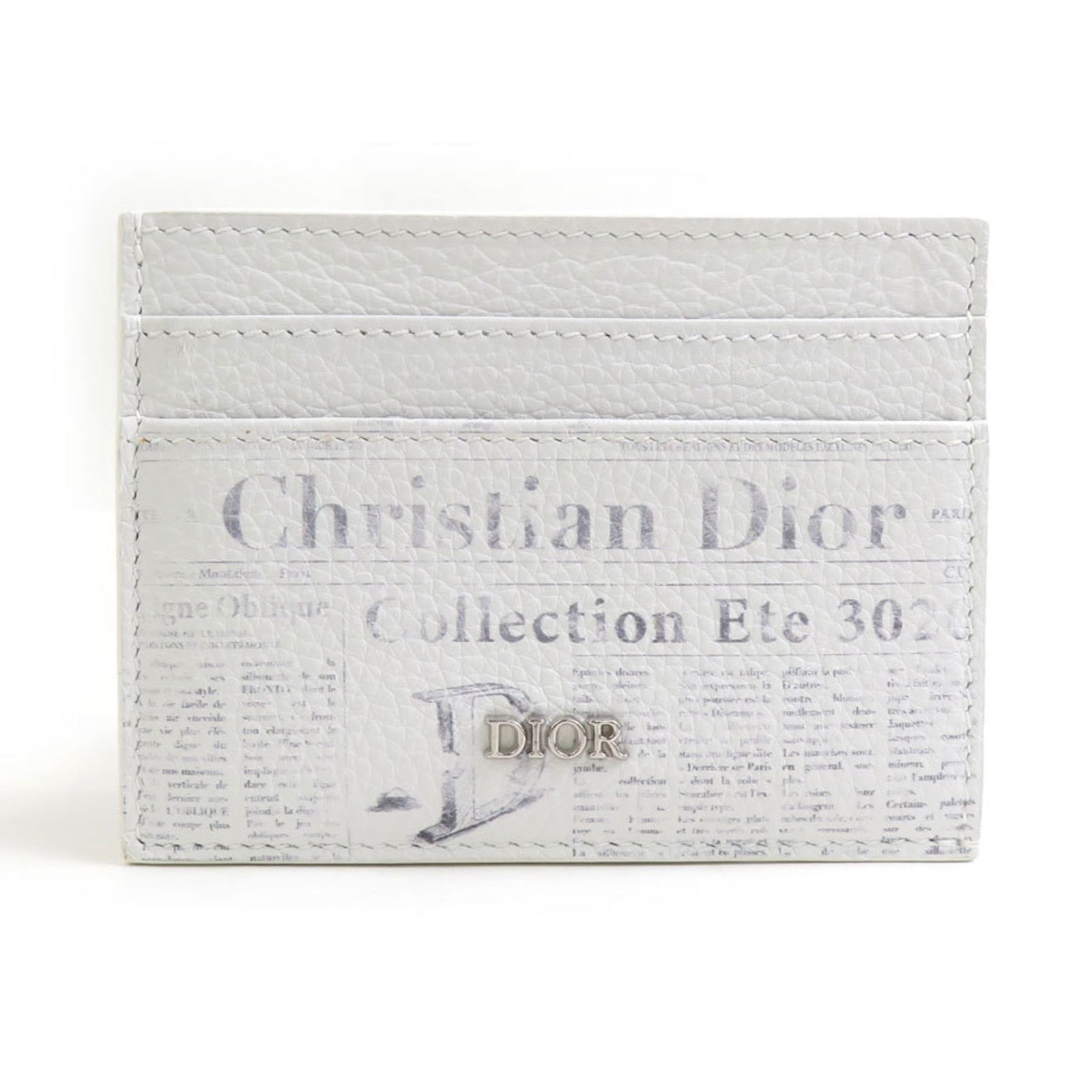 Christian Dior Card Case in Leather: Christian Dior Card Case in Leather A timeless piece from the iconic Christian Dior brand, this white leather card case exudes elegance and sophistication. With its classic design and high-quality