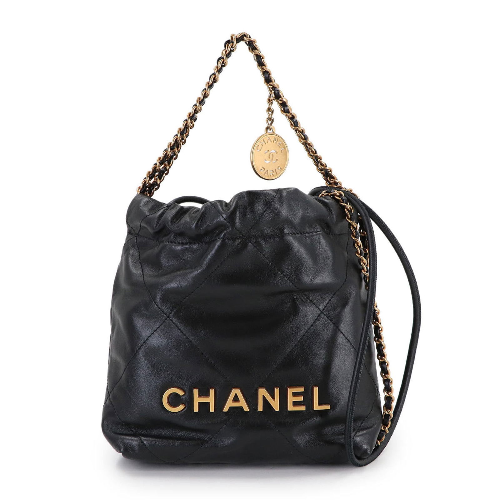 Chanel Shoulder Bag in Leather: Chanel Shoulder Bag in Leather A sleek and sophisticated Chanel shoulder bag, crafted from rich black calfskin leather, adds an effortless touch of luxury to any outfit. With its classic design and ti