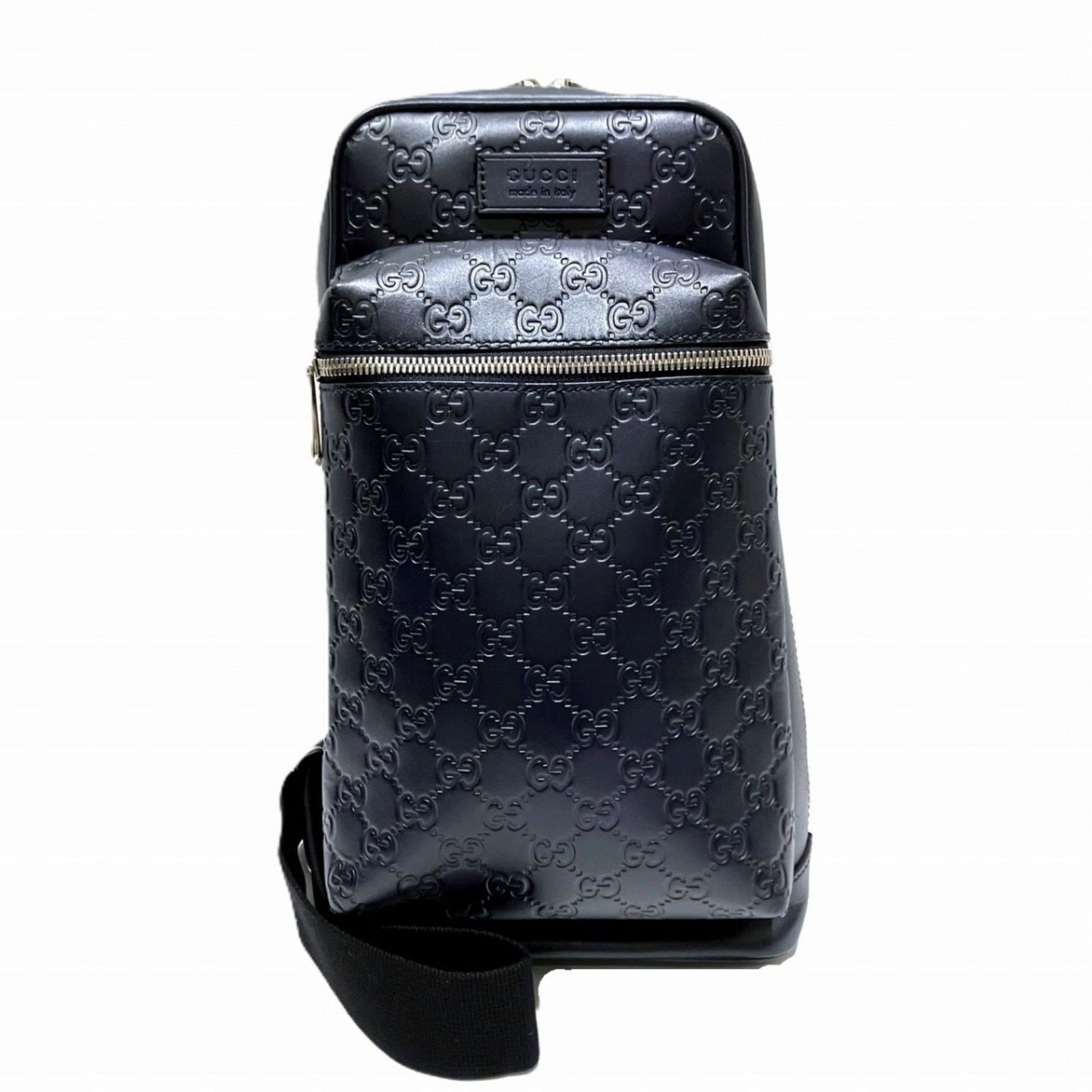 Leather Gucci Sling Bag: Leather Gucci Sling Bag A pre-owned Gucci leather sling bag in navy, boasting classic style with clean lines and premium materials, featuring a timeless design that exudes sophistication and