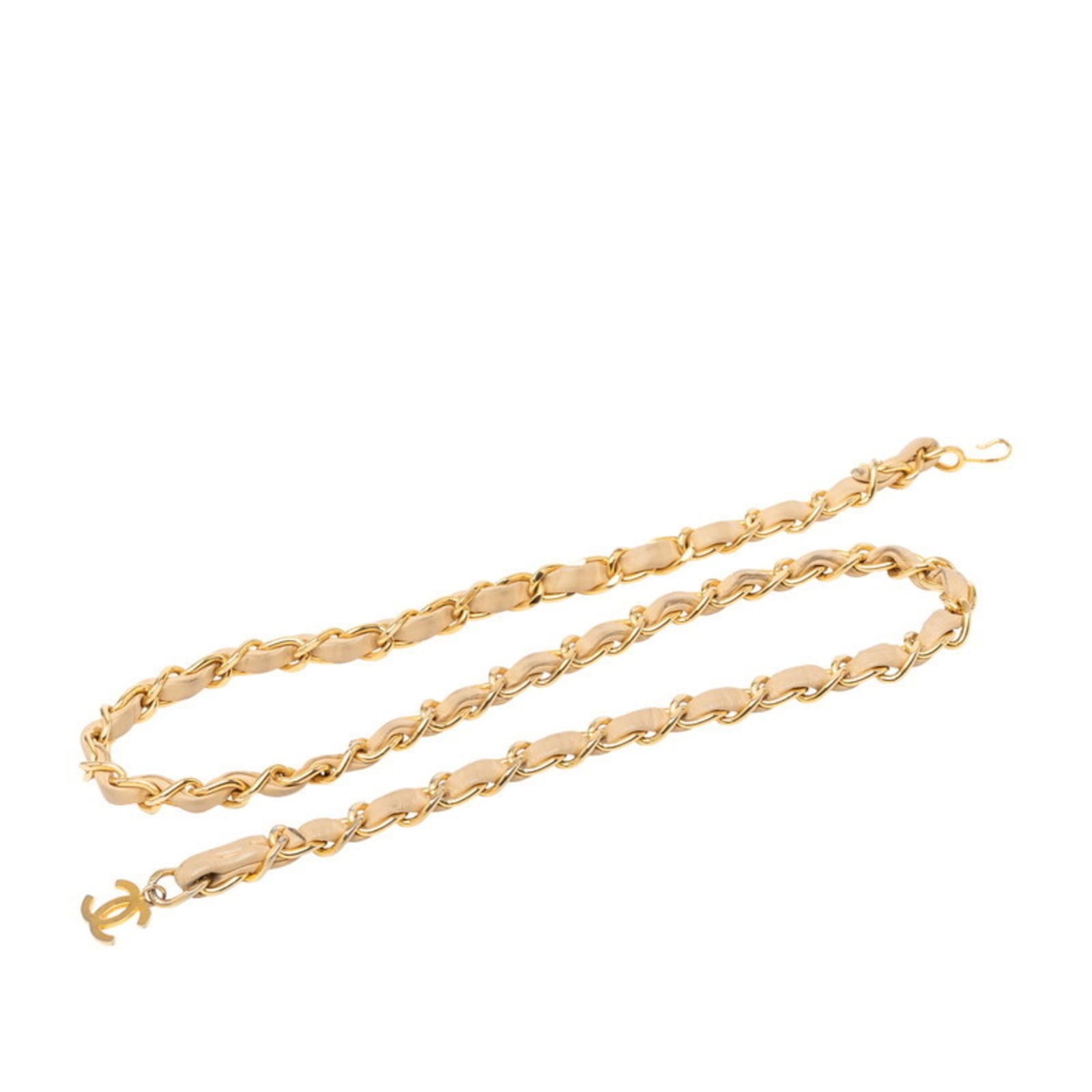 Belt Chanel Chain: Belt Chanel Chain A timeless Chanel chain belt, this beige leather strap is adorned with subtle gold accents, adding a touch of sophistication to any outfit. With its classic design and elegant