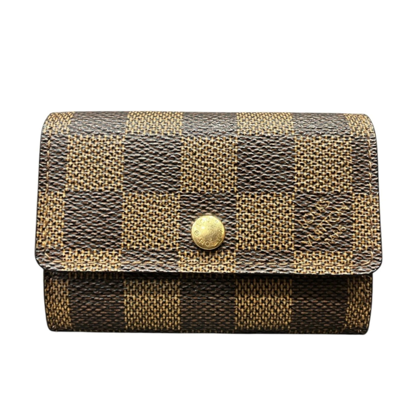 Louis Vuitton Coin Purse in PVC: Louis Vuitton Coin Purse in PVC A stylish and functional accessory for the modern man, this Louis Vuitton coin purse in PVC is a rare find. Made from high-quality PVC, it boasts the iconic LV