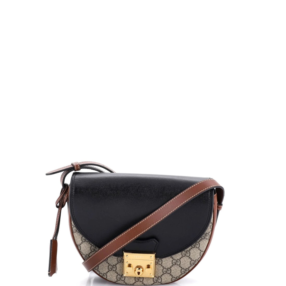 Gucci Saddle Shoulder Bag in GG Coated Canvas and Leather - Small: Gucci Saddle Shoulder Bag in GG Coated Canvas and Leather - Small The Gucci Saddle Shoulder Bag is a timeless and sophisticated accessory that exudes luxury. With its GG Coated Canvas and Leather