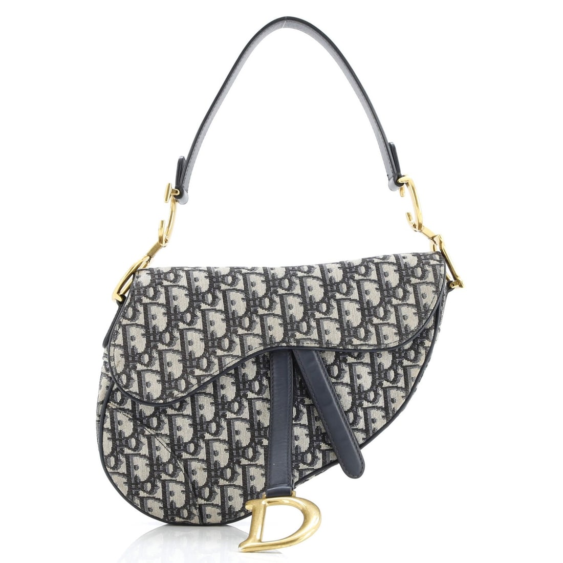 Christian Dior Saddle Handbag in Medium Oblique Canvas: Christian Dior Saddle Handbag in Medium Oblique Canvas A stunning Christian Dior Saddle Handbag in medium oblique canvas, boasting a timeless blue hue that exudes sophistication and elegance. With