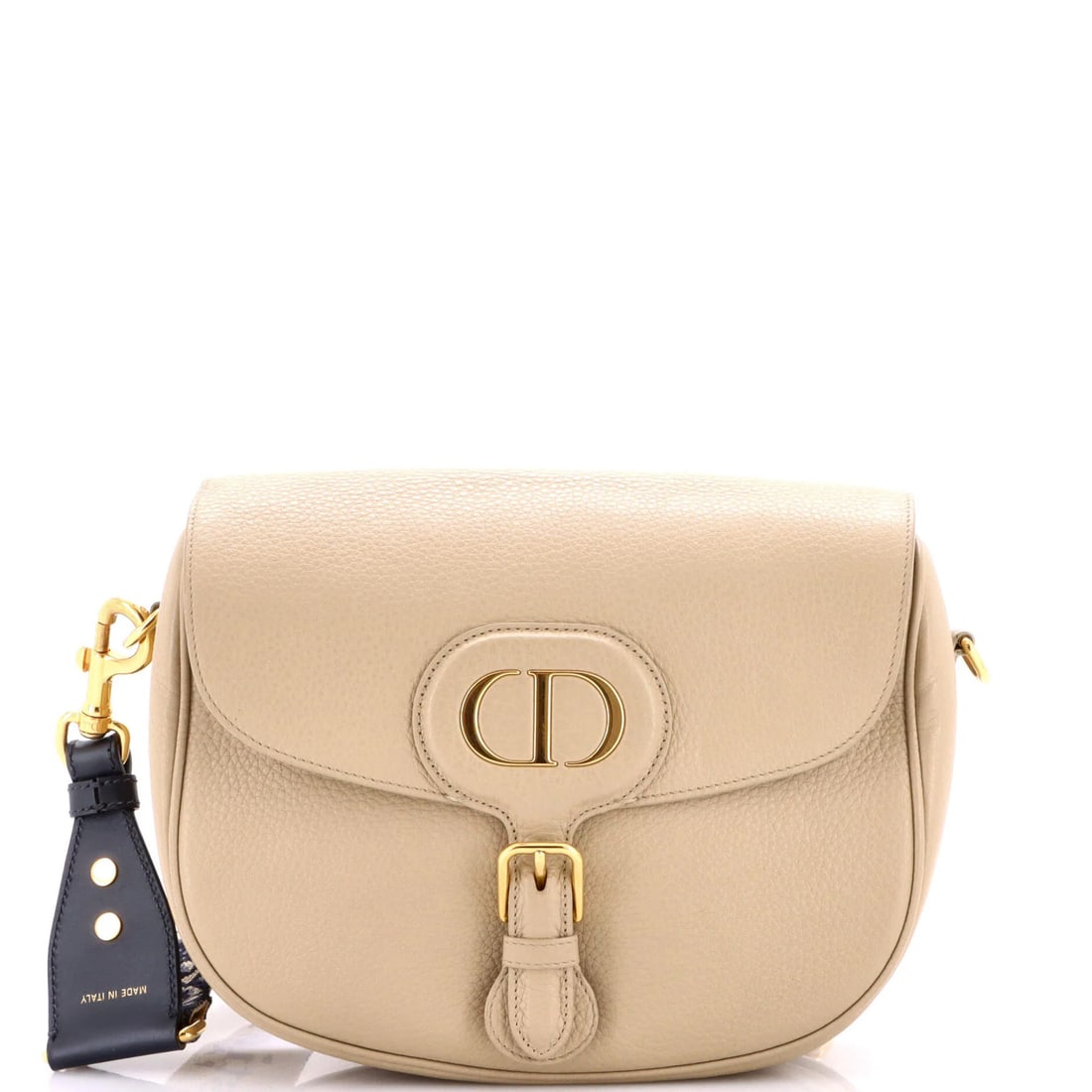 Christian Dior Bobby Flap Bag - Large Leather: Christian Dior Bobby Flap Bag - Large Leather Experience the timeless elegance of the Christian Dior Bobby Flap Bag, a classic cross-body design that exudes sophistication and poise. With its neutral