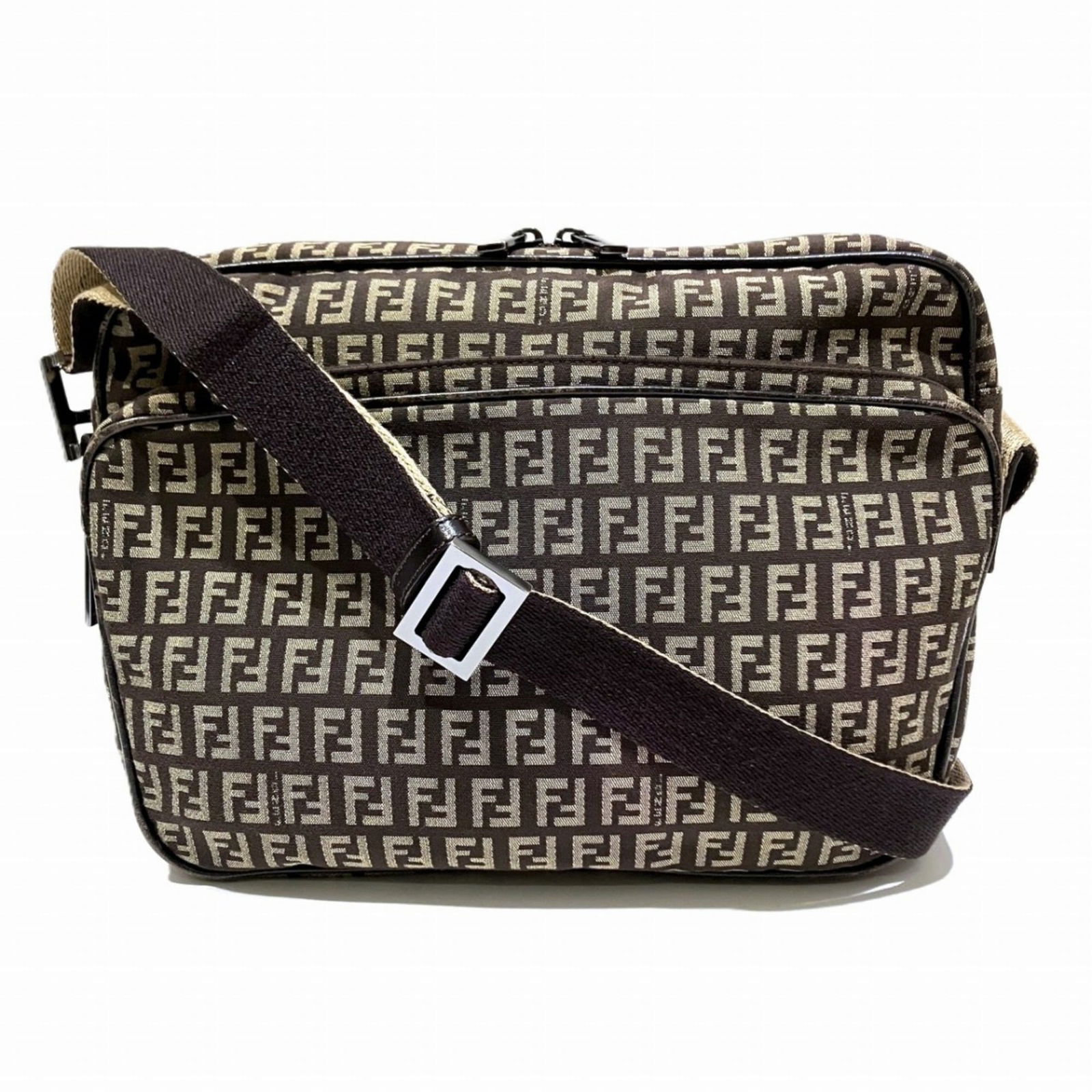 Fendi Canvas and Leather Shoulder Bag: Fendi Canvas and Leather Shoulder Bag Elevate your everyday style with the iconic Fendi canvas and leather shoulder bag, boasting a timeless beige and brown color combination that exudes