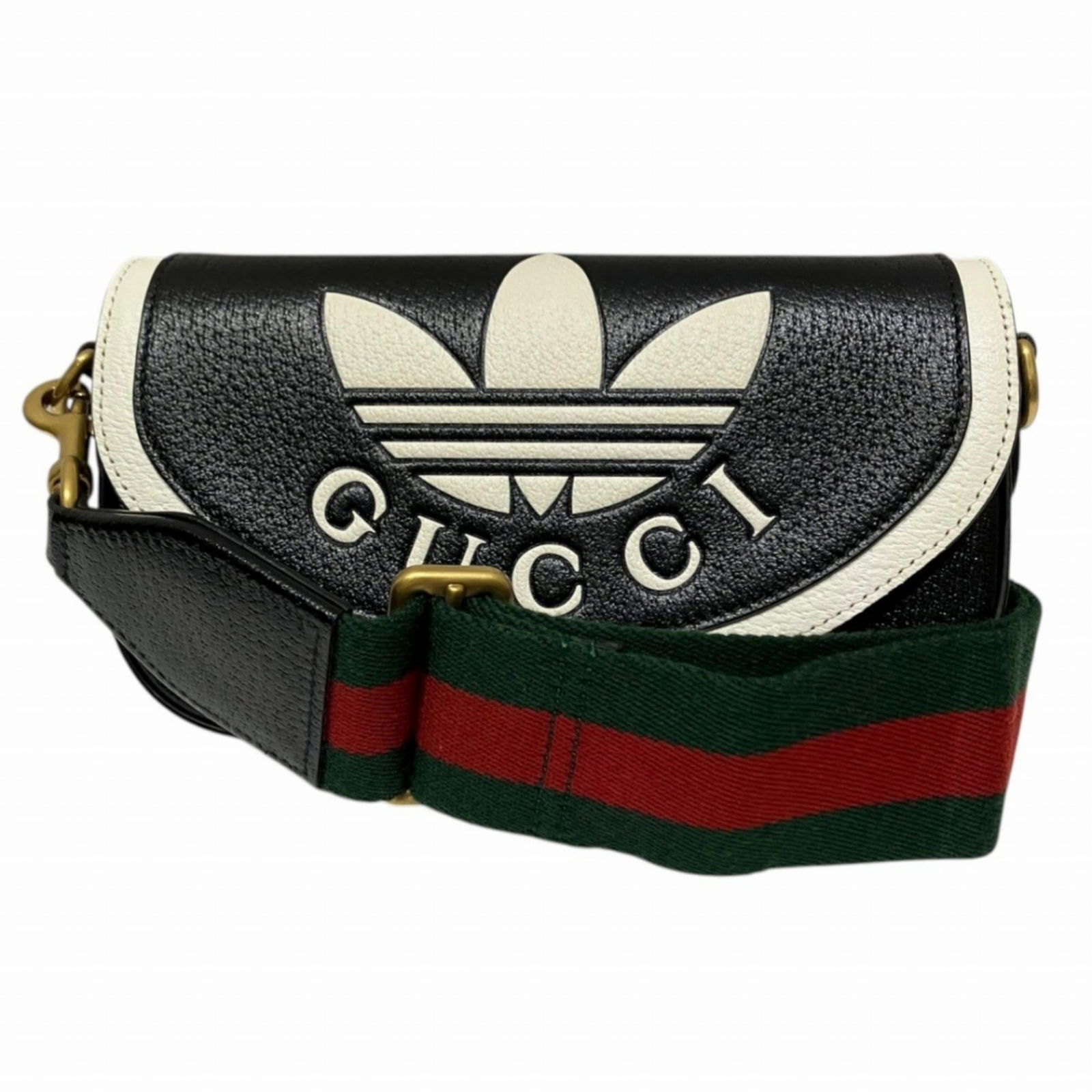 Gucci Leather Shoulder Bag: Gucci Leather Shoulder Bag A sleek and sophisticated Gucci leather shoulder bag, perfect for adding a touch of luxury to your daily routine. With its classic design and high-quality black leather,