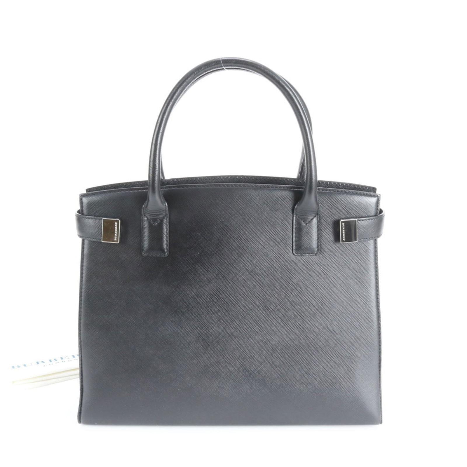 Burberry Leather Tote Bag: Burberry Leather Tote Bag A timeless and sophisticated choice, this pre-loved Burberry leather tote bag boasts classic design with premium quality leather in sleek black. With its spacious interior