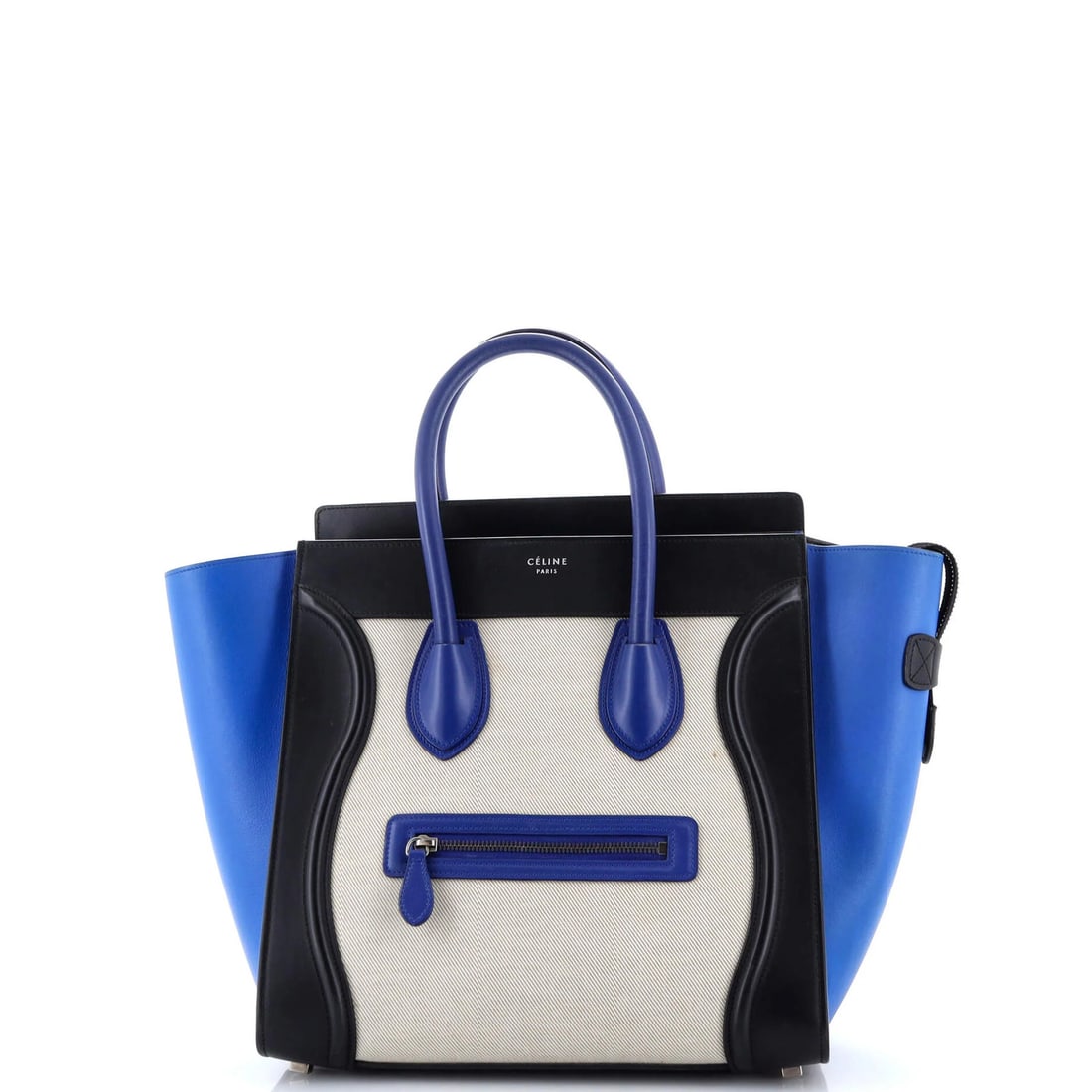 Celine Tricolor Mini Luggage Bag in Canvas and Leather: Celine Tricolor Mini Luggage Bag in Canvas and Leather The Celine Tricolor Mini Luggage Bag is a stylish and practical accessory for the modern traveler, boasting a chic canvas and leather exterior