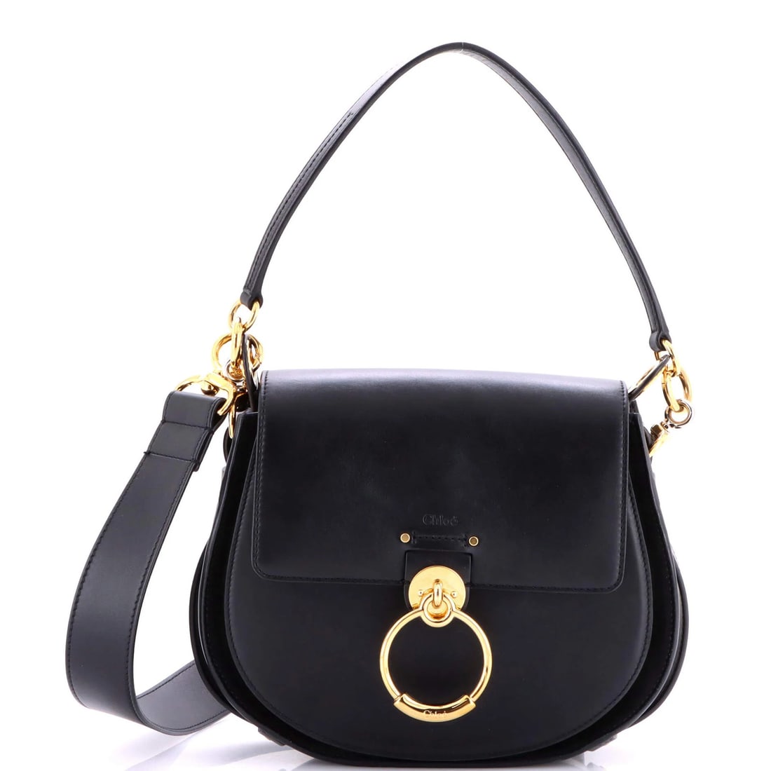 Large Chloe Tess Bag Leather: Large Chloe Tess Bag Leather Experience the timeless elegance of the Chloe Tess Bag, a sophisticated cross-body design that exudes refinement and poise. With its sleek black leather exterior, suede