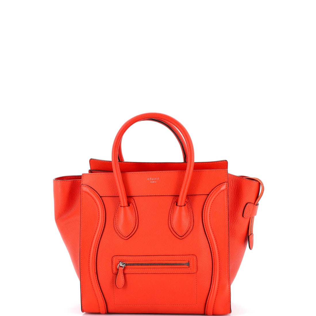 Celine Mini Grainy Leather Luggage Bag: Celine Mini Grainy Leather Luggage Bag This vibrant orange Celine Mini Grainy Leather Luggage Bag is a stylish and functional accessory for your travels. With its sleek, mini size and high-quality