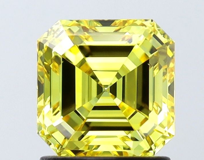 IGI Asscher 1.57ct Fancy Vivid Yellow VVS2 Loose Lab Diamond: IGI Asscher 1.57ct Fancy Vivid Yellow VVS2 Loose Lab Diamond A true gem for the discerning collector, this 1.57ct Fancy Vivid Yellow VVS2 loose lab diamond boasts exceptional clarity and color, with a