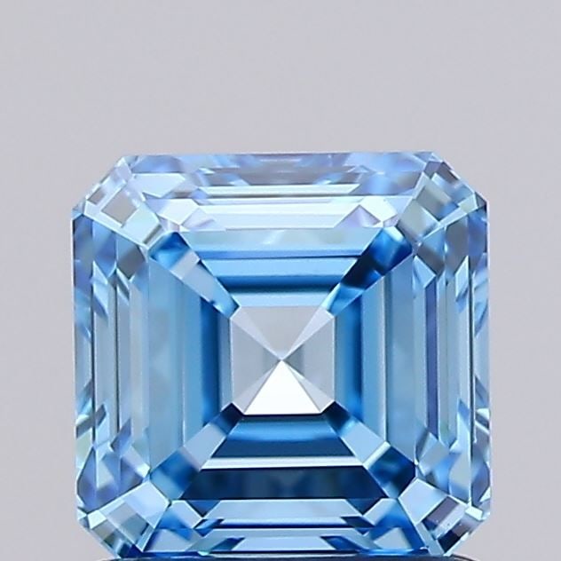 IGI Asscher 1.01ct Fancy Vivid Blue VVS1 Loose Lab Diamond: IGI Asscher 1.01ct Fancy Vivid Blue VVS1 Loose Lab Diamond Experience the rare beauty of a Fancy Vivid Blue diamond, one of the most coveted colors in the gemstone world. This exquisite 1.01ct lab-gro