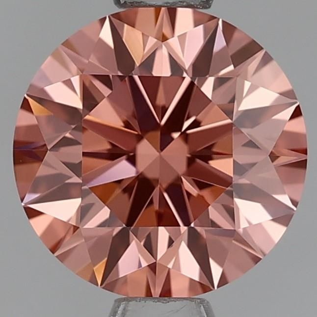 Loose Lab Diamond - Round 1.05ct Fancy Orangey Pink VVS2: Loose Lab Diamond - Round 1.05ct Fancy Orangey Pink VVS2 A truly unique gem, this 1.05ct Fancy Orangey Pink lab diamond boasts an exceptional VVS2 clarity and vibrant color, making it a standout among