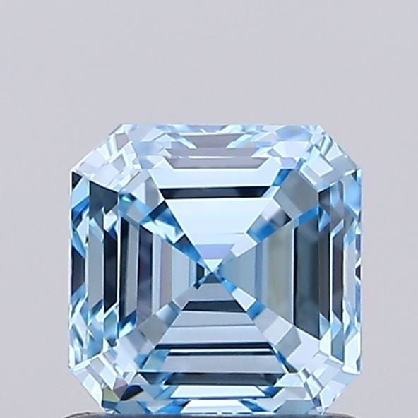 IGI Asscher 0.91ct Fancy Vivid Blue VVS1 Loose Lab Diamond: IGI Asscher 0.91ct Fancy Vivid Blue VVS1 Loose Lab Diamond Experience the breathtaking beauty of a Fancy Vivid Blue lab diamond, certified by the International Gemological Institute (IGI). This stunni