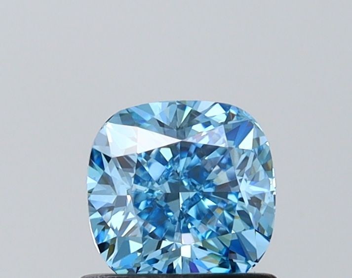 Loose Lab Diamond - IGI Cushion Modified 0.92ct Fancy Vivid Blue VVS2: Loose Lab Diamond - IGI Cushion Modified 0.92ct Fancy Vivid Blue VVS2 Experience the breathtaking beauty of a Fancy Vivid Blue lab diamond, certified by IGI as 0.92ct VVS2 in an EX polished cushion cu