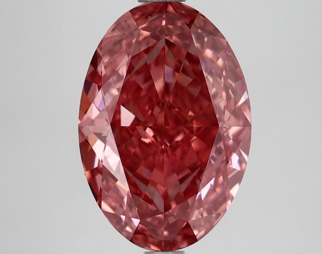 IGI Oval 4.11ct Fancy Vivid Pink VVS2 Loose Lab Diamond: IGI Oval 4.11ct Fancy Vivid Pink VVS2 Loose Lab Diamond Experience the rare beauty of a Fancy Vivid Pink diamond, one of the most coveted colors in the world of gemstones. This stunning 4.11ct lab-gro