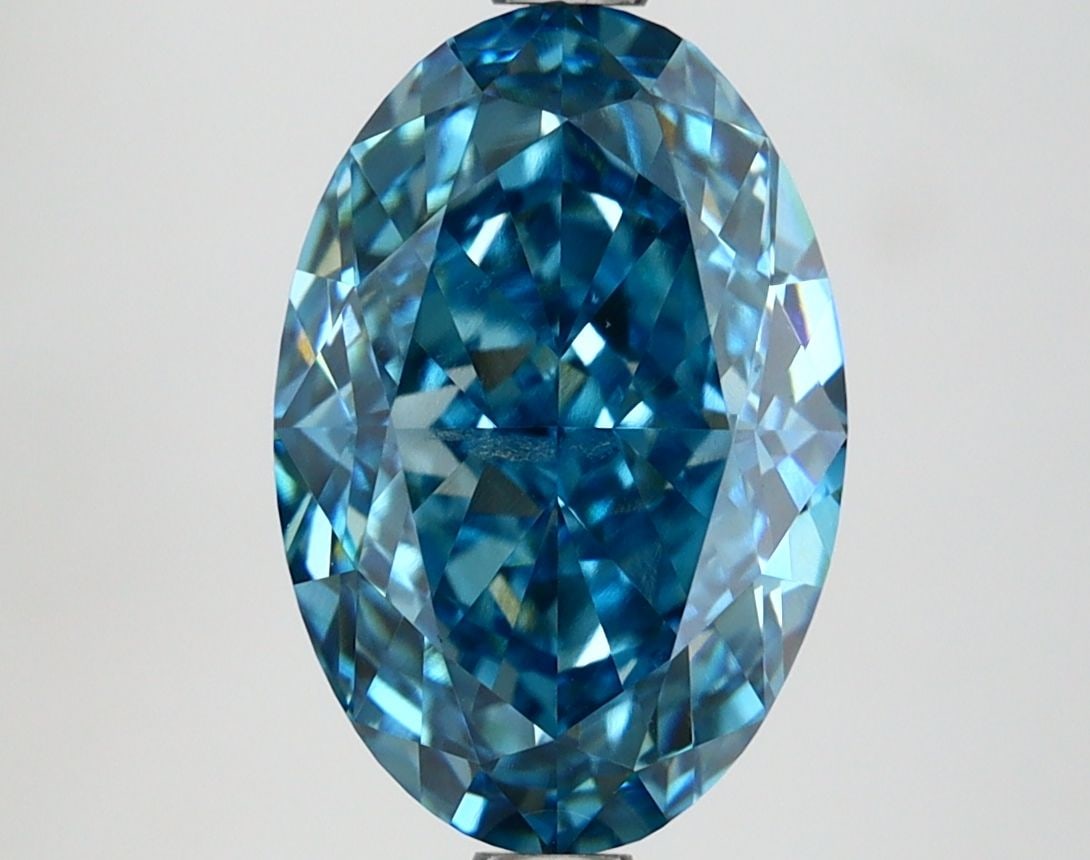 IGI Oval 3.7ct Fancy Vivid Blue VVS2 Loose Lab Diamond: IGI Oval 3.7ct Fancy Vivid Blue VVS2 Loose Lab Diamond Experience the unparalleled beauty of a Fancy Vivid Blue diamond, one of the rarest and most sought-after colors in nature. This exquisite 3.7ct