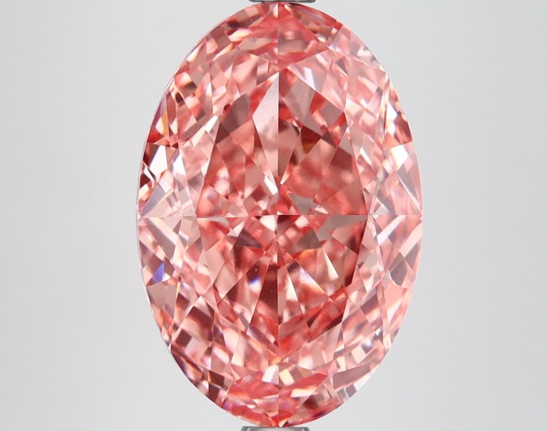 IGI Oval 5.51ct Fancy Vivid Pink VVS2 Loose Lab Diamond: IGI Oval 5.51ct Fancy Vivid Pink VVS2 Loose Lab Diamond Experience the breathtaking beauty of a lab-grown diamond, certified by IGI as Fancy Vivid Pink with exceptional clarity and cut. This stunning