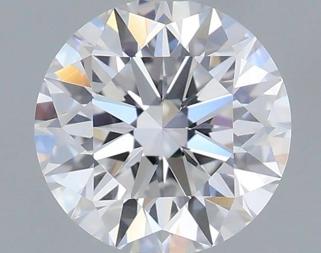 IGI Round 0.87ct D VVS2 Ideal Loose Lab Diamond: IGI Round 0.87ct D VVS2 Ideal Loose Lab Diamond Experience the brilliance of a lab-grown diamond, certified by IGI as a D color, VVS2 clarity, and EX polish and symmetry. This 0.87ct round gemstone sh