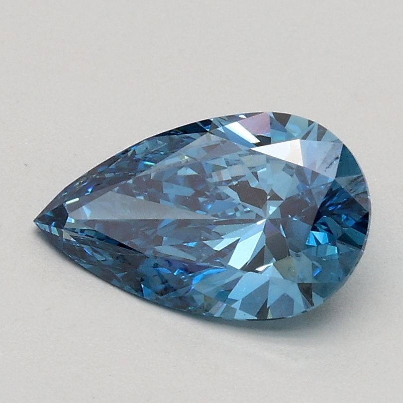Loose Lab Diamond - IGI Pear 0.76ct Fancy Vivid Blue VVS2: Loose Lab Diamond - IGI Pear 0.76ct Fancy Vivid Blue VVS2 Experience the rare beauty of a Fancy Vivid Blue lab diamond, certified by the International Gemological Institute (IGI). This stunning 0.76ct