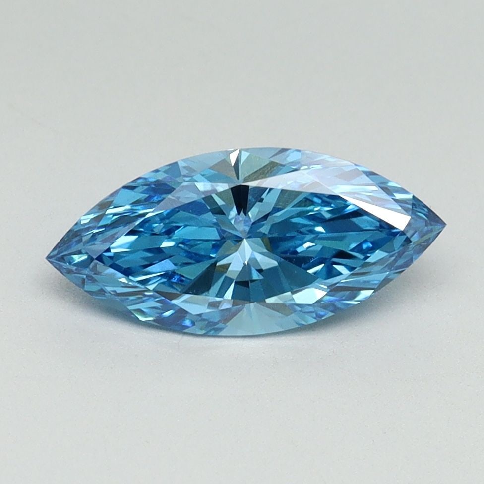 IGI Marquise 1.01ct Fancy Vivid Blue VVS2 Loose Lab Diamond: IGI Marquise 1.01ct Fancy Vivid Blue VVS2 Loose Lab Diamond Experience the rare beauty of a Fancy Vivid Blue diamond, one of the most sought-after colors in the world of gemstones. This exquisite 1.01