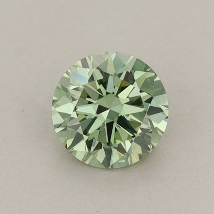 IGI Round 0.56ct Fancy Vivid Green VVS2 Loose Lab Diamond: IGI Round 0.56ct Fancy Vivid Green VVS2 Loose Lab Diamond Experience the rare beauty of a Fancy Vivid Green lab-grown diamond, certified by IGI and boasting exceptional clarity (VVS2) and color