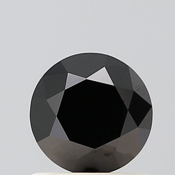 Black VVS2 0.68ct Round Lab Diamond: Black VVS2 0.68ct Round Lab Diamond A rare and stunning black lab diamond, certified VVS2 clarity, boasts exceptional cut quality with EX polish and symmetry. This 0.68ct round gemstone is grown in a