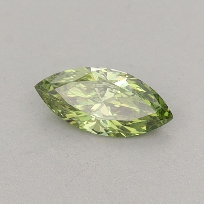 IGI Marquise 0.23ct Fancy Vivid Green VVS2 Loose Lab Diamond: IGI Marquise 0.23ct Fancy Vivid Green VVS2 Loose Lab Diamond Experience the rare beauty of a Fancy Vivid Green lab diamond, certified by IGI and boasting exceptional clarity (VVS2) and polish (VG). Th