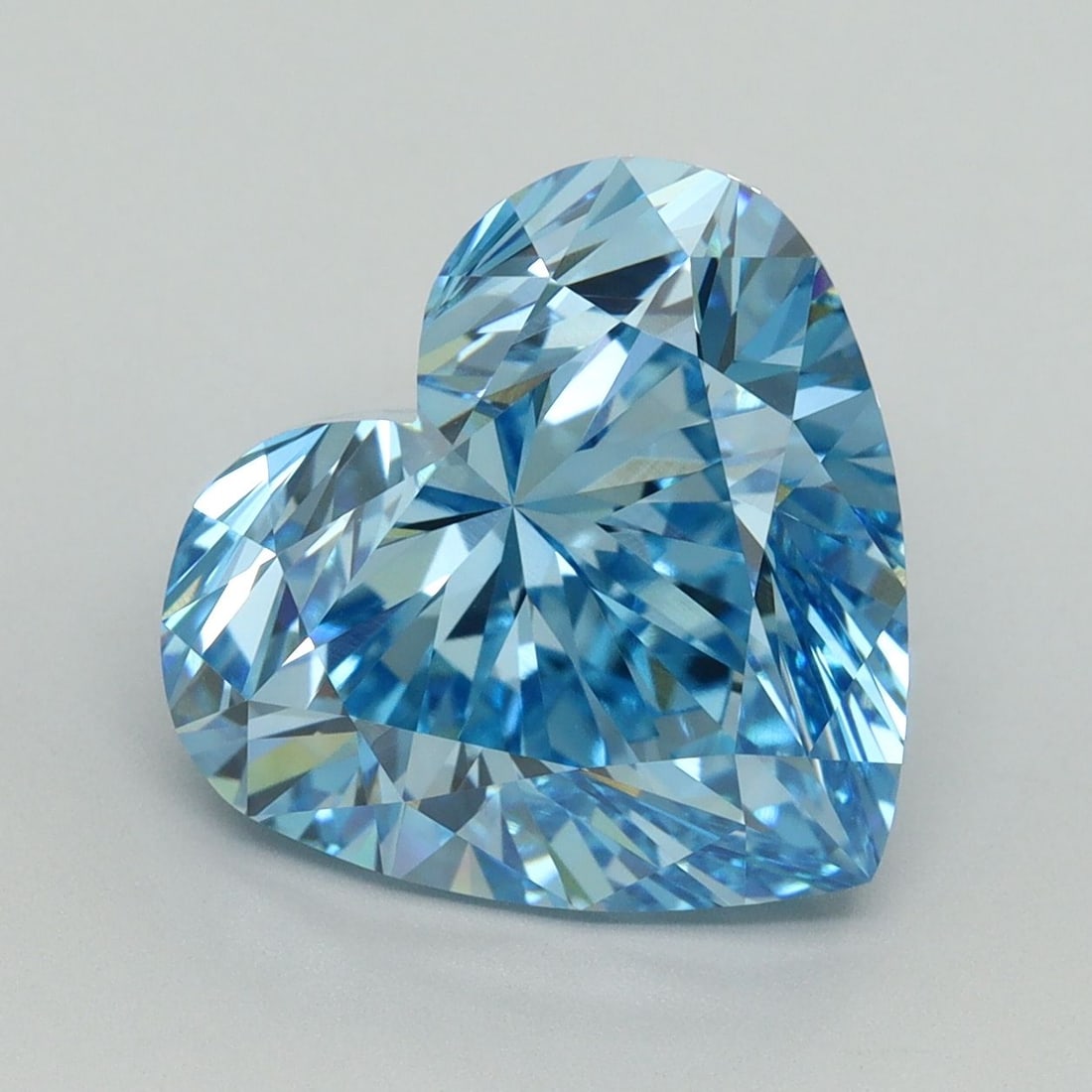 Loose Lab Diamond - IGI Heart 6.16ct Fancy Vivid Blue VVS2: Loose Lab Diamond - IGI Heart 6.16ct Fancy Vivid Blue VVS2 Experience the breathtaking beauty of a lab-grown diamond, certified by the International Gemological Institute (IGI) as Fancy Vivid Blue wit