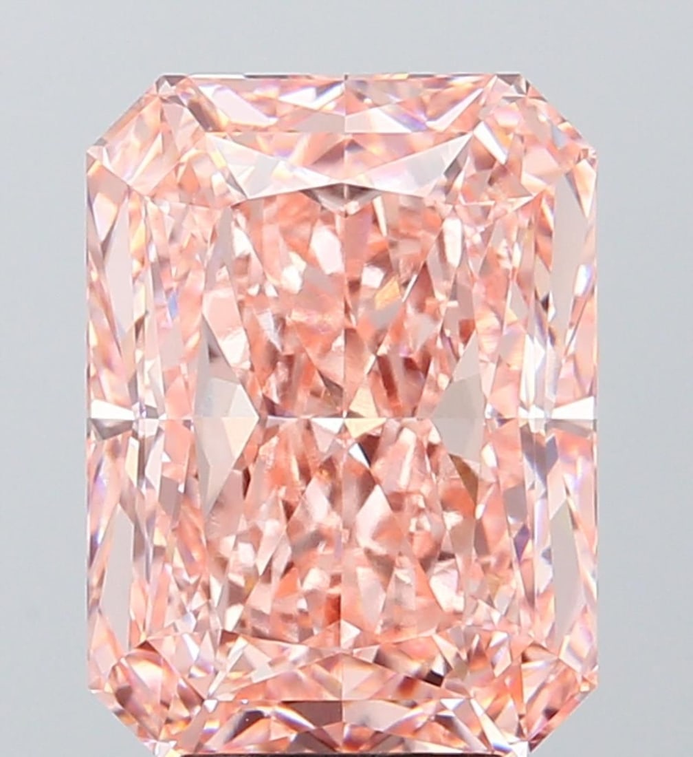 IGI Radiant 6.6ct Fancy Vivid Pink VVS2 Loose Lab Diamond: IGI Radiant 6.6ct Fancy Vivid Pink VVS2 Loose Lab Diamond Experience the unparalleled beauty of a lab-grown diamond, expertly certified by IGI as a Fancy Vivid Pink VVS2 gemstone. This stunning 6.6ct