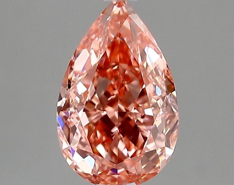 Loose Lab Diamond - IGI Pear 1.5ct Fancy Vivid Pink VVS2: Loose Lab Diamond - IGI Pear 1.5ct Fancy Vivid Pink VVS2 Experience the rare beauty of a lab-grown diamond, certified by IGI as a Fancy Vivid Pink gemstone with exceptional clarity and polish. This 1.