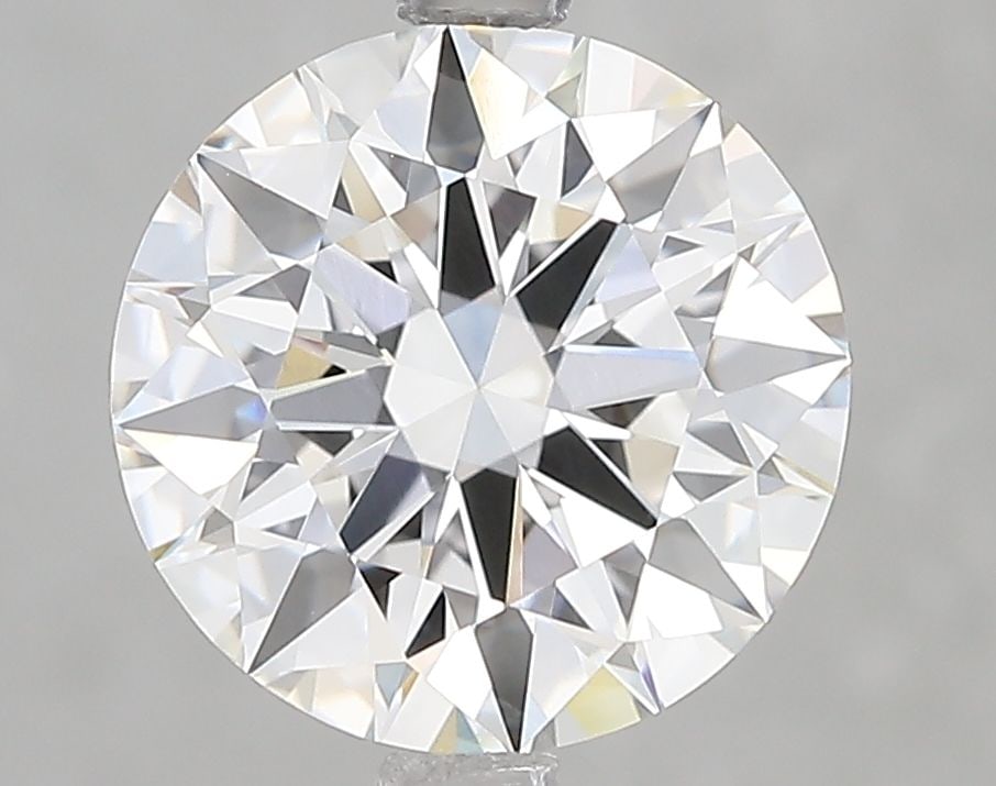 IGI Round 3.07ct E VVS2 Ideal Loose Lab Diamond: IGI Round 3.07ct E VVS2 Ideal Loose Lab Diamond Experience the brilliance of a lab-grown diamond, certified by IGI as a genuine 3.07ct E VVS2 Ideal Round Brilliant cut. This exceptional stone boasts a