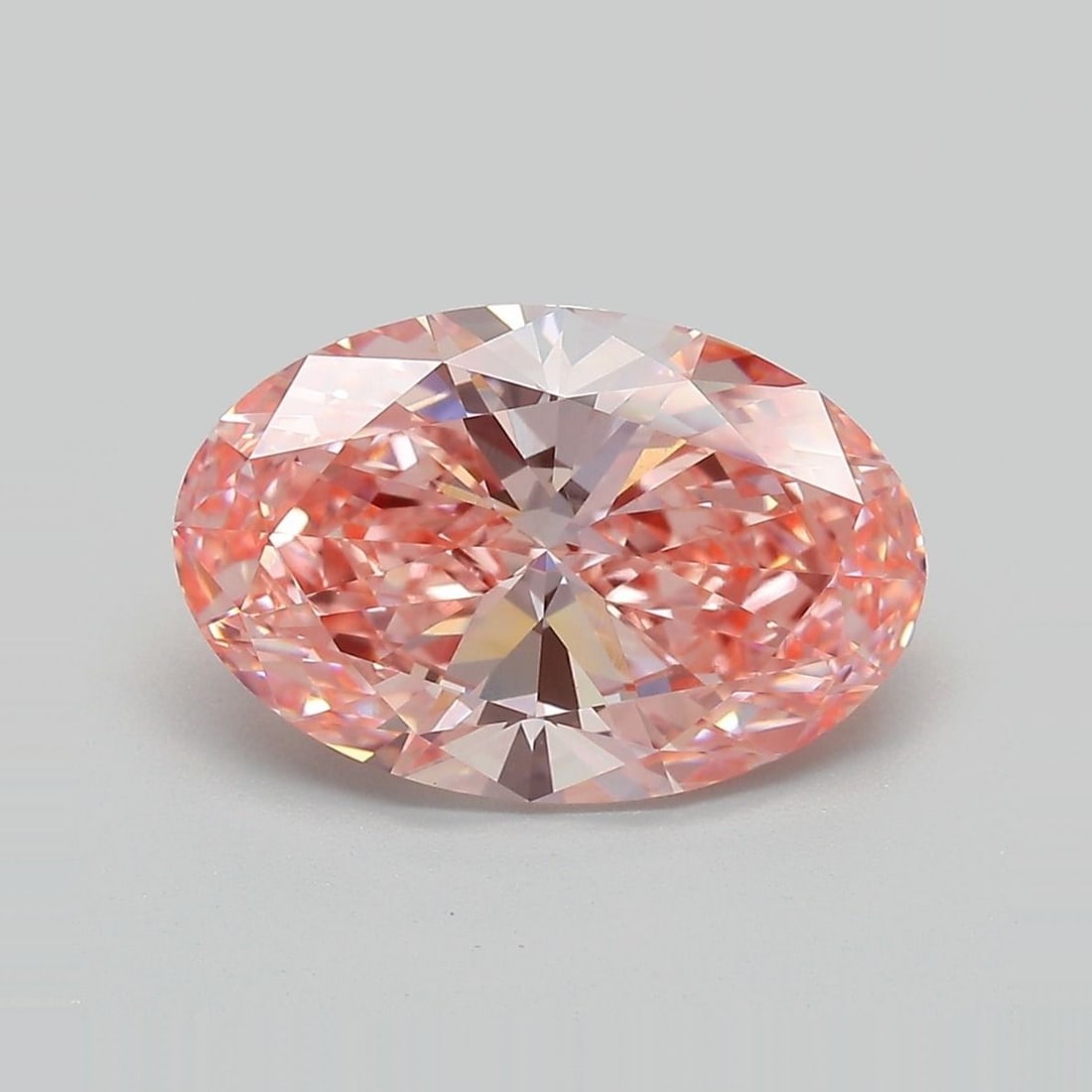 IGI Oval 4.07ct Fancy Vivid Pink VVS2 Loose Lab Diamond: IGI Oval 4.07ct Fancy Vivid Pink VVS2 Loose Lab Diamond Experience the breathtaking beauty of a lab-grown diamond, certified by IGI as a Fancy Vivid Pink gemstone weighing 4.07 carats. Its exceptional