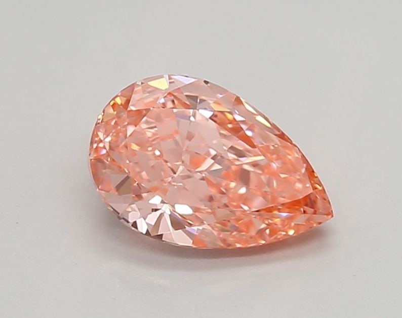 Loose Lab Diamond - IGI Pear 0.97ct Fancy Vivid Pink VVS2: Loose Lab Diamond - IGI Pear 0.97ct Fancy Vivid Pink VVS2 Experience the breathtaking beauty of a lab-grown diamond, certified by IGI as Fancy Vivid Pink with exceptional clarity and cut. This stunnin