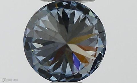 IGI Round 0.35ct Fancy Vivid Blue VVS1 Loose Lab Diamond: IGI Round 0.35ct Fancy Vivid Blue VVS1 Loose Lab Diamond Experience the rare beauty of a Fancy Vivid Blue diamond, one of the most coveted colors in the world of gemstones. This exquisite 0.35ct lab-g