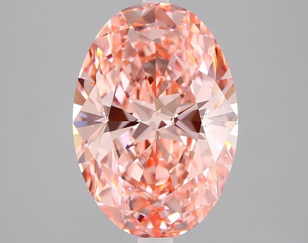 IGI Oval 3.0ct Fancy Vivid Pink VVS1 Loose Lab Diamond: IGI Oval 3.0ct Fancy Vivid Pink VVS1 Loose Lab Diamond Experience the rare beauty of a Fancy Vivid Pink diamond, one of the most coveted colors in the world of gemstones. This exquisite 3.0ct lab-grow