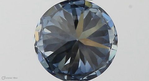 IGI Round 0.57ct Fancy Vivid Blue VVS2 Loose Lab Diamond: IGI Round 0.57ct Fancy Vivid Blue VVS2 Loose Lab Diamond Experience the breathtaking beauty of a Fancy Vivid Blue diamond, one of the rarest and most stunning colors in nature. This exquisite 0.57ct I