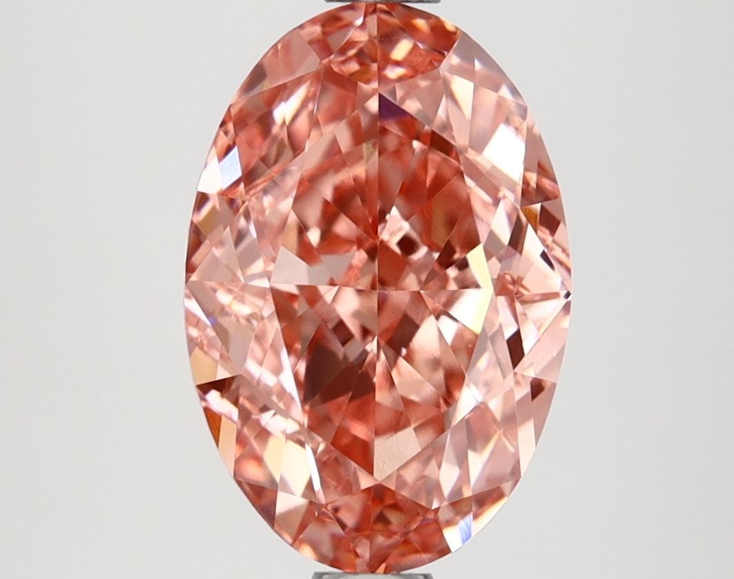 IGI Oval 2.57ct Fancy Vivid Pink VVS2 Loose Lab Diamond: IGI Oval 2.57ct Fancy Vivid Pink VVS2 Loose Lab Diamond Experience the rare beauty of a Fancy Vivid Pink diamond, one of the most coveted colors in the world of gemstones. This exquisite 2.57ct lab-gr
