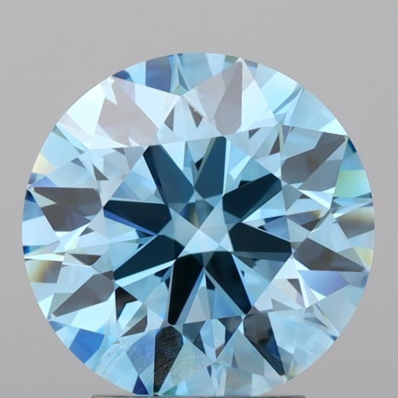 IGI Round 3.44ct Fancy Vivid Blue VVS2 Ideal Loose Lab Diamond: IGI Round 3.44ct Fancy Vivid Blue VVS2 Ideal Loose Lab Diamond Experience the breathtaking beauty of a lab-grown Fancy Vivid Blue diamond, certified by IGI and boasting exceptional clarity, cut, and c