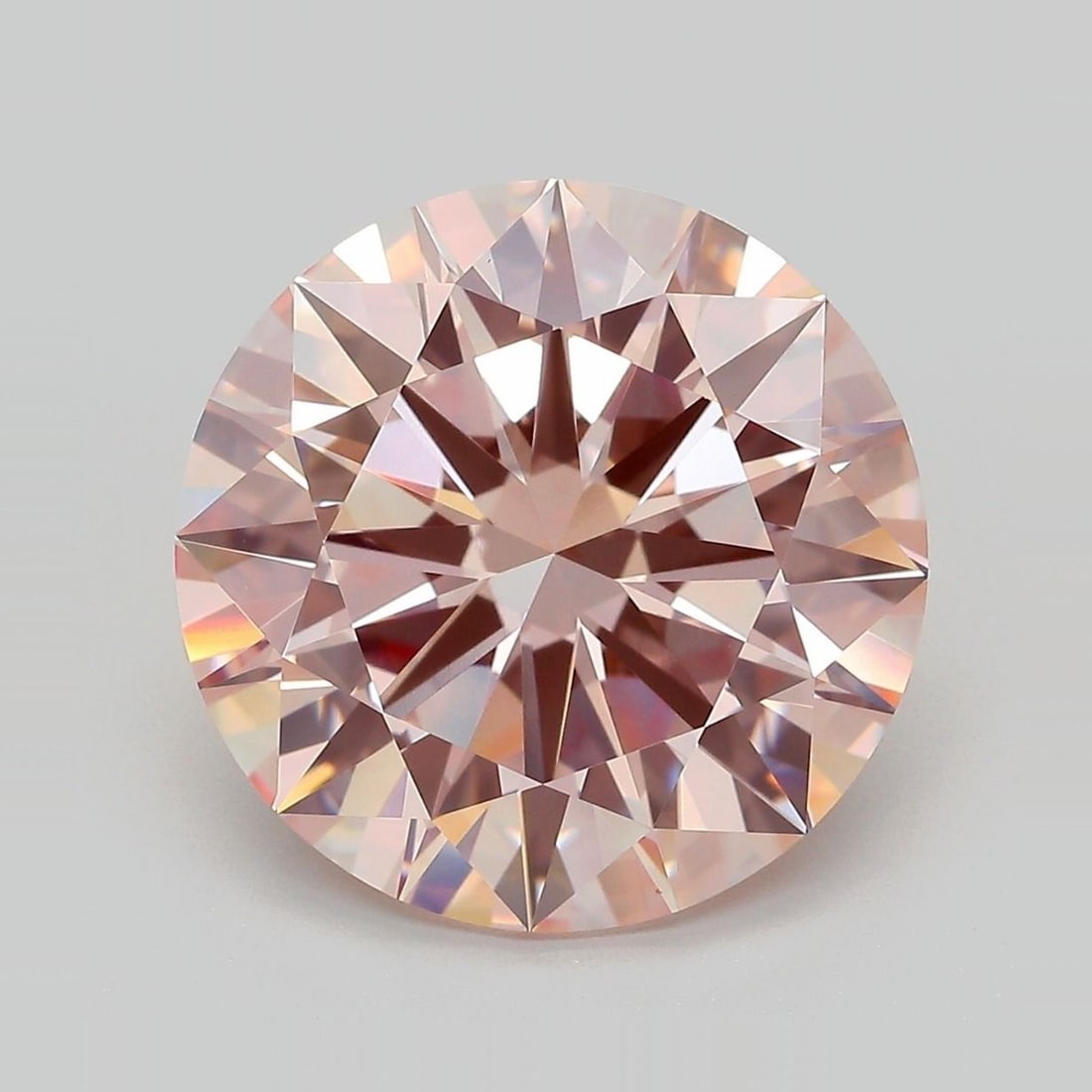 Ideal Loose Lab Diamond - IGI Round 9.36ct Fancy Intense Pink VVS2: Ideal Loose Lab Diamond - IGI Round 9.36ct Fancy Intense Pink VVS2 Experience the unparalleled beauty of a lab-grown diamond, certified by IGI as a 9.36ct Fancy Intense Pink gemstone with exceptional