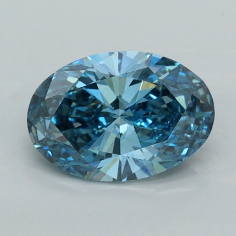 IGI Oval 1.03ct Fancy Vivid Blue VVS2 Loose Lab Diamond: IGI Oval 1.03ct Fancy Vivid Blue VVS2 Loose Lab Diamond Experience the unparalleled beauty of a Fancy Vivid Blue diamond, one of the rarest and most sought-after colors in nature. This exquisite 1.03c