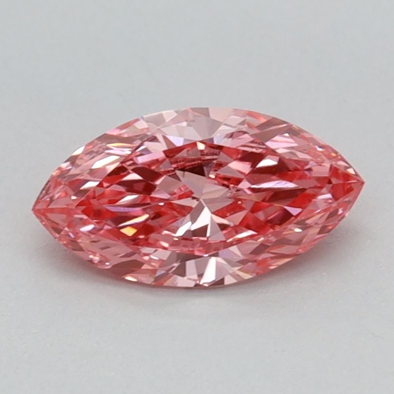 IGI Marquise 0.57ct Fancy Vivid Pink VVS2 Loose Lab Diamond: IGI Marquise 0.57ct Fancy Vivid Pink VVS2 Loose Lab Diamond A true gem for the discerning collector, this 0.57ct Fancy Vivid Pink lab-grown diamond boasts exceptional clarity and color, with a VVS2 gr