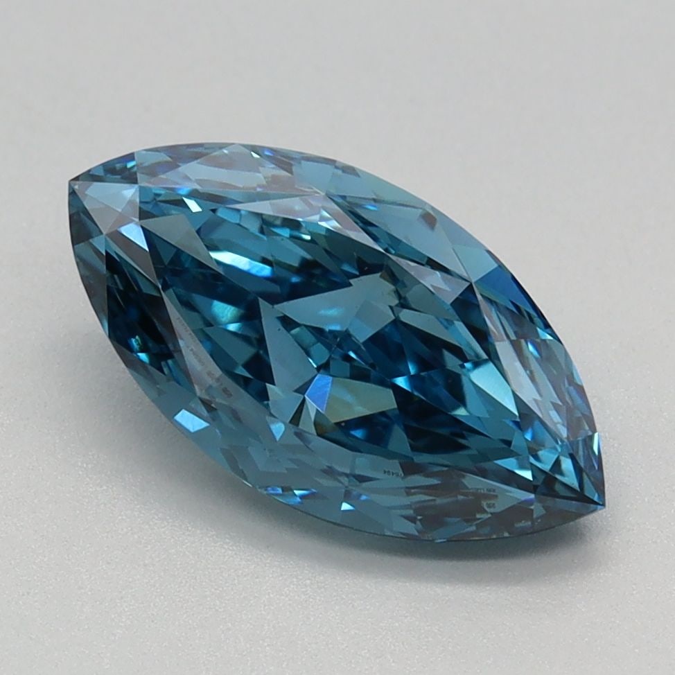 IGI Marquise 1.57ct Fancy Vivid Blue VVS2 Loose Lab Diamond: IGI Marquise 1.57ct Fancy Vivid Blue VVS2 Loose Lab Diamond Experience the breathtaking beauty of a Fancy Vivid Blue diamond, one of the rarest and most coveted colors in nature. This stunning 1.57ct