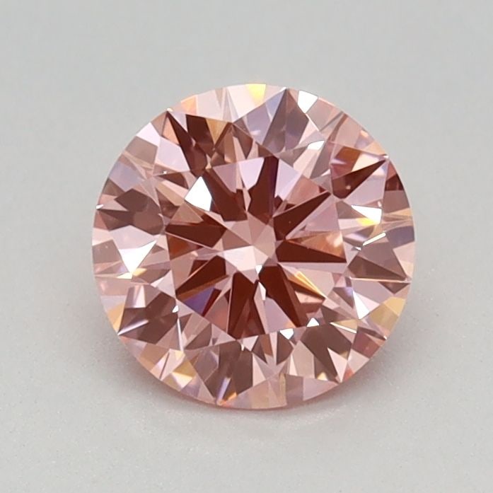 IGI Round 0.61ct Fancy Vivid Pink VVS2 Ideal Loose Lab Diamond: IGI Round 0.61ct Fancy Vivid Pink VVS2 Ideal Loose Lab Diamond Experience the beauty of a lab-grown diamond, expertly certified by IGI and boasting an impressive 0.61 carat Fancy Vivid Pink color, VVS