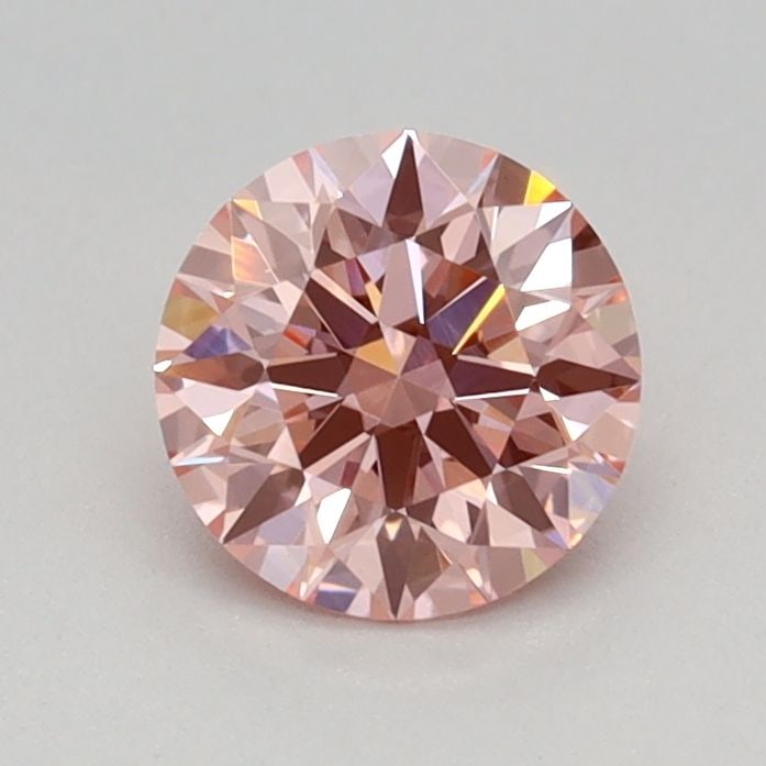 IGI Round 0.56ct Fancy Vivid Pink VVS2 Ideal Loose Lab Diamond: IGI Round 0.56ct Fancy Vivid Pink VVS2 Ideal Loose Lab Diamond Experience the rare beauty of a Fancy Vivid Pink diamond, one of the most coveted colors in the world of gemstones. This exquisite 0.56ct