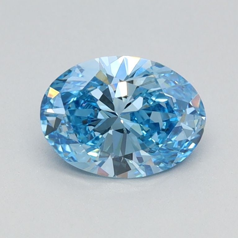 IGI Oval 0.65ct Fancy Vivid Blue VVS2 Loose Lab Diamond: IGI Oval 0.65ct Fancy Vivid Blue VVS2 Loose Lab Diamond Experience the breathtaking beauty of a Fancy Vivid Blue diamond, one of the rarest and most coveted colors in nature. This stunning 0.65ct lab-