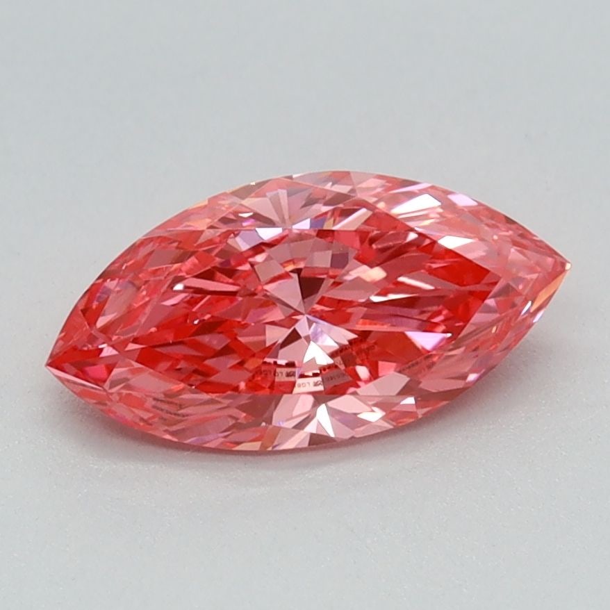IGI Marquise 0.84ct Fancy Vivid Pink VVS2 Diamond: IGI Marquise 0.84ct Fancy Vivid Pink VVS2 Diamond Experience the rare beauty of a Fancy Vivid Pink diamond, one of the most coveted colors in nature. This 0.84ct lab-grown gem boasts exceptional clari