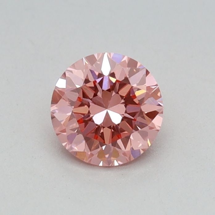 IGI Round 0.32ct Fancy Vivid Pink VVS2 Loose Lab Diamond: IGI Round 0.32ct Fancy Vivid Pink VVS2 Loose Lab Diamond Experience the beauty of a lab-grown diamond, certified by IGI as Fancy Vivid Pink with exceptional clarity and polish. This 0.32ct gem shines