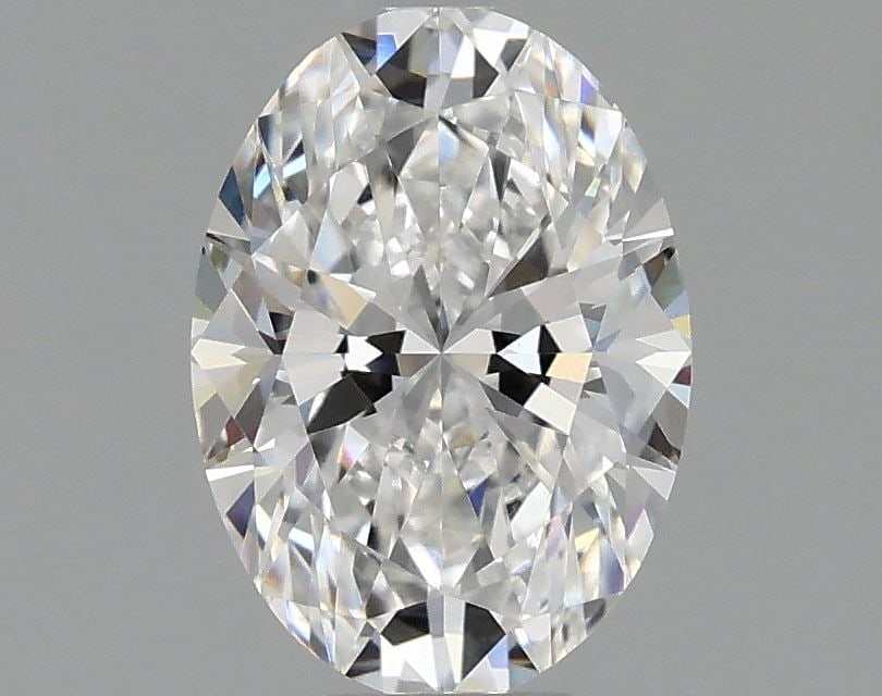 IGI Oval 1.04ct D VVS2 Diamond: IGI Oval 1.04ct D VVS2 Diamond Experience the exceptional brilliance of this 1.04ct IGI Oval diamond, boasting an impressive D color and VVS2 clarity for maximum fire and light transmission. Grown in